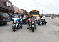 ALR Riders with Chapter 374 provide an escort to the Millard Public Library for viewing of the Remembering Our Fallen Display